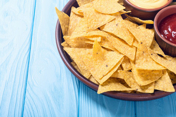 Crispy chips nachos with tomato and cheese sauce