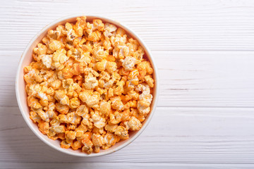 Yellow cheese popcorn in bowl