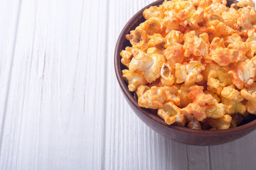 Yellow cheese popcorn in bowl
