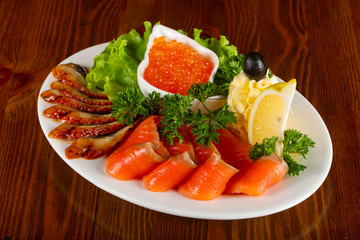 Trout fillet, red caviar and eel