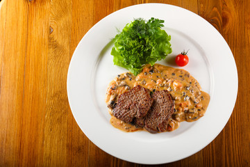 Beef with mushroom sauce