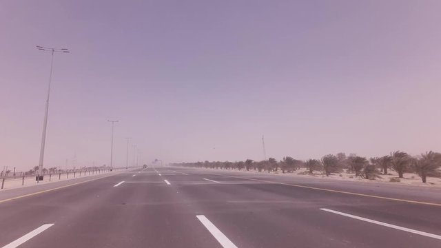 Sandstorm sweeps the sand on highway stock footage video
