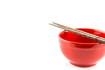 Fresh red bowl with chopsticks isolated on white