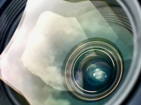 DLSR Lens reflecting sky