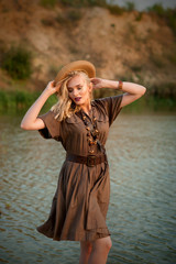 girl in a dress in a safari style circle of water