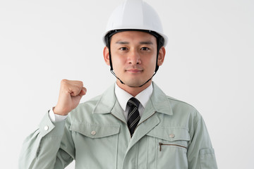 ビジネスマン、ヘルメット、ブルゾン、ガッツ、ガッツポーズ