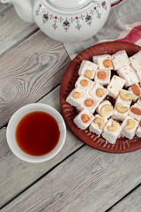 Turkish delight on a wooden table.