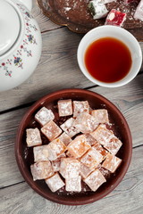 Turkish delight on a wooden table.