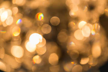 Obraz premium abstract background of golden bokeh