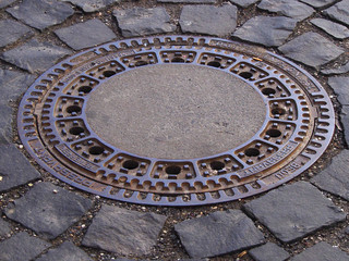 Decorative cover of the sewage well.