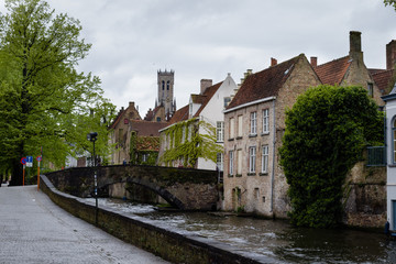 Fototapeta premium Cityscape of Flanders, BRUGES, Belgium BELGIUM - 30 April 2018. Water canal in Bruges.