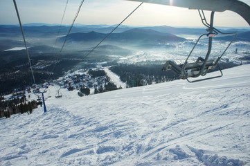 Fototapeta na wymiar ski resort winter vacation ski snowboard snow forest