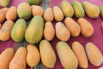 Pile of yellow papaya for sell on market.