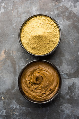 Henna / Mehandi powder and paste. Prepared for Hair colouring or for tattoo on hand in Indian weddings/festivals. selective focus