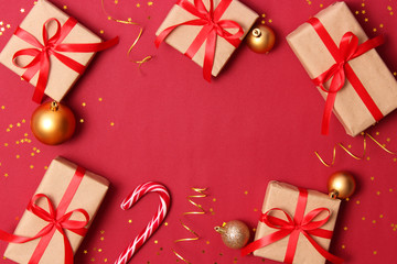 New Year's gifts, sweets and festive ribbons on a colored background. holiday, giving, new year, christmas, birthday