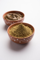Henna / Mehandi powder and paste. Prepared for Hair colouring or for tattoo on hand in Indian weddings/festivals. selective focus