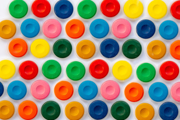 Background of watercolor colorful paint tablets