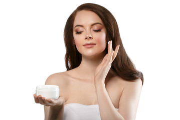 Woman with cream face skin care concept, healthy clean fresh face skin close up, female model with creanm in hand