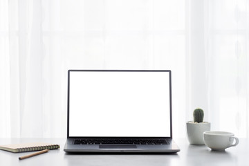 Office desk table with laptop computer, supplies with copy space in the office.