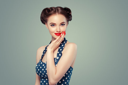 Pinup woman beauty portrait vintage retro girl model in polka dot dress