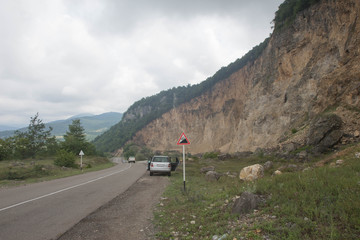 raffic of cars. Road, the natural landscape and Mountains