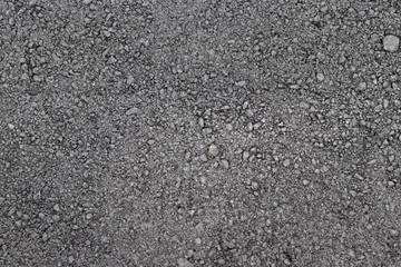 Smooth asphalt road. The texture of the tarmac, top view.