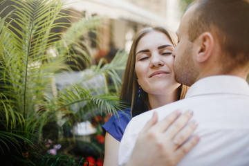 Beautiful happy couple embracing in the city.  