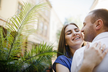 Beautiful happy couple embracing in the city.  