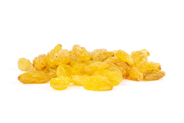 Lot of whole dry golden raisins sultana variety heap isolated on white background