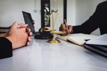 notary consultant concept , Judge gavel with client consult lawyer lawsuit bankruptcy of her....