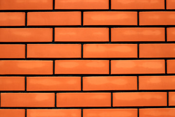 Red brick wall texture grunge background may use to interior design