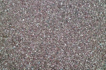 Colorful gravel on the floor in the park. Background concept. Soft focus.