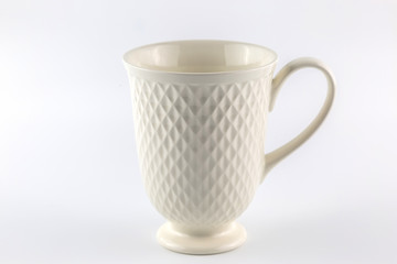 White coffee cup on white background