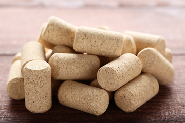 Wine corks on brown wooden table