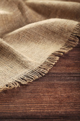 Sackcloth texture on brown wooden table
