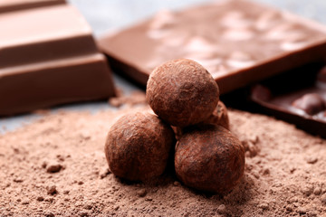 Chocolate balls on cocoa powder
