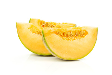 Group of three slices of fresh melon cantaloupe variety isolated on white background