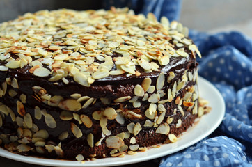Cheesecake cake with chocolate and almond flakes