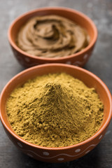 Henna / Mehandi powder and paste. Prepared for Hair colouring or for tattoo on hand in Indian weddings/festivals. selective focus