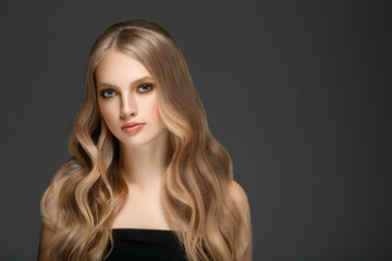 Fototapeta premium Beautiful Woman Face Portrait Beauty Skin Care Concept with long blonde hair 
