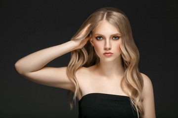 Fototapeta premium Beautiful Woman Face Portrait Beauty Skin Care Concept with long blonde hair 