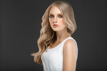 Beautiful Woman Face Portrait Beauty Skin Care Concept with long blonde hair 