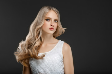 Fototapeta premium Beautiful Woman Face Portrait Beauty Skin Care Concept with long blonde hair 
