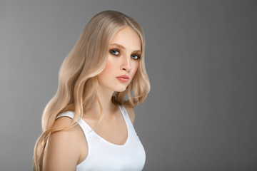 Fototapeta premium Beautiful Woman Face Portrait Beauty Skin Care Concept with long blonde hair 