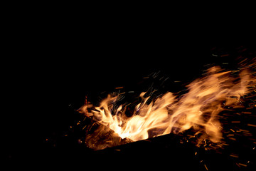 Fire flames on a black background. The fire burns on a black background.