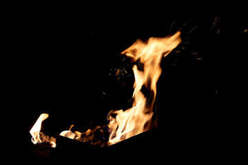 Fire flames on a black background. The fire burns on a black background.