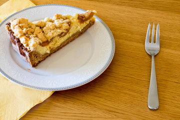 Sweet dessert on the plate with a fork