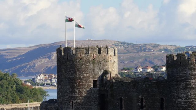 Welsh flags flying at Conwy Castle Conwy Gwynedd Wales