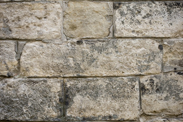 Old stone wall close-up. Texture background