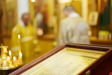 Candles in Orthodox Russian Church. Blur background 